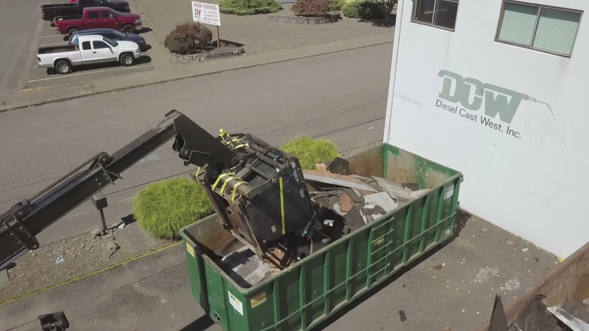 Asbestos abatement, dry rot repair, cover board installation, 60 Mil Versico.